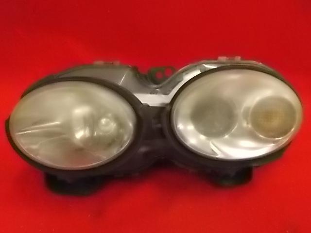 Jaguar x type head light assembly drivers  side poor cosmetic condition