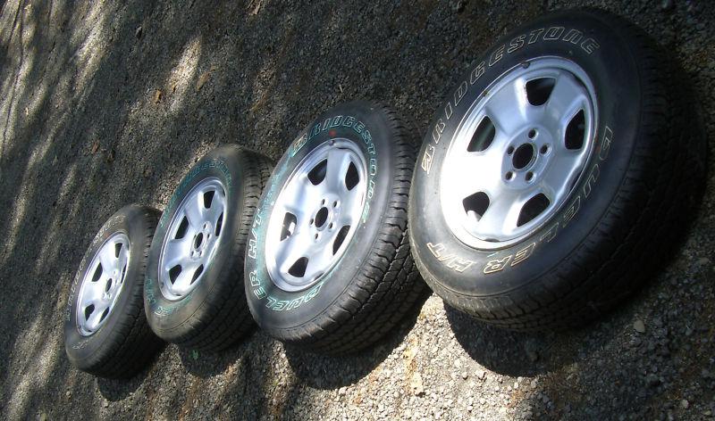 Set of four (4) wheels bridgestone dueler 205/70r15 tires subaru forester rims