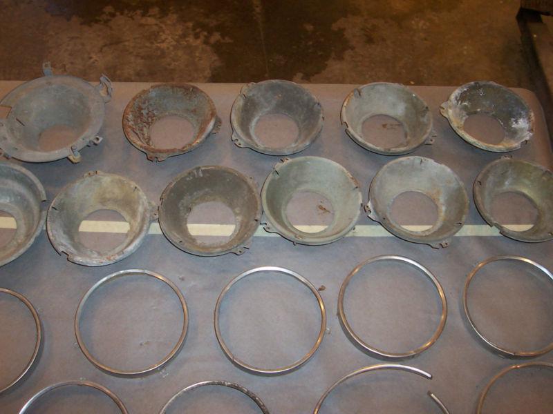 Lot of 60s  headlight rings and mounting buckets chevelle impala