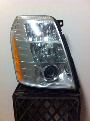 Cadillac gm oem headlight assembly passenger side 