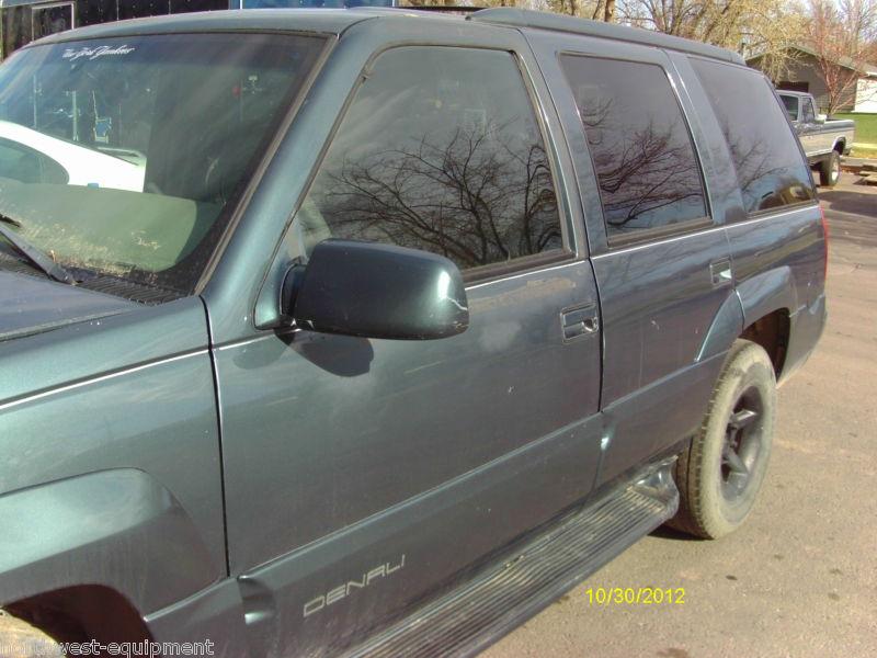 1999 99 gmc yukon denali left front door metallic teal bc/cc 132