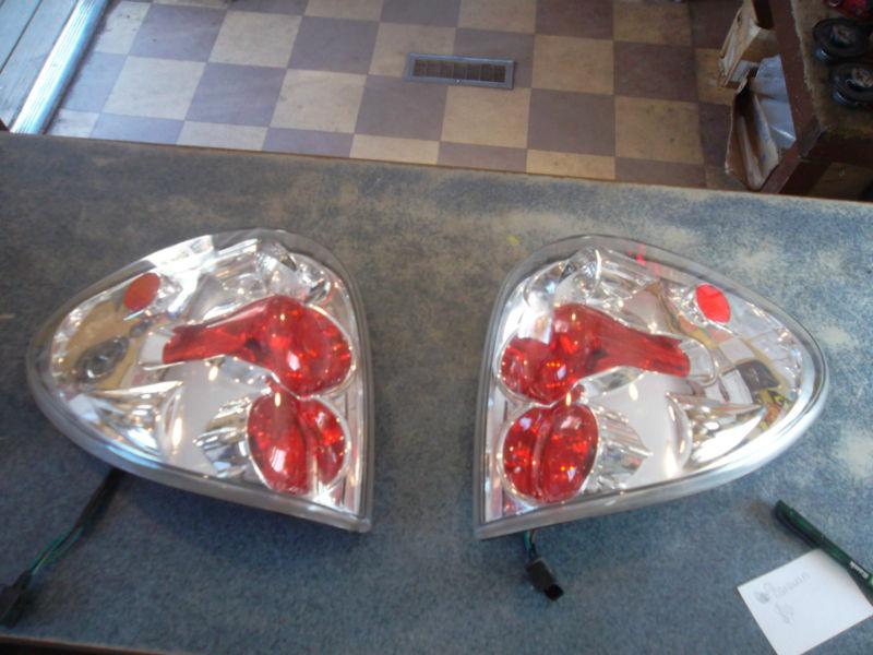 2001 dodge caravan aftermarket taillights (pair)