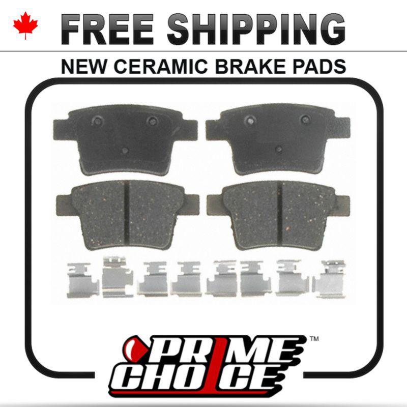 New premium complete set of rear ceramic disc brake pads with shims