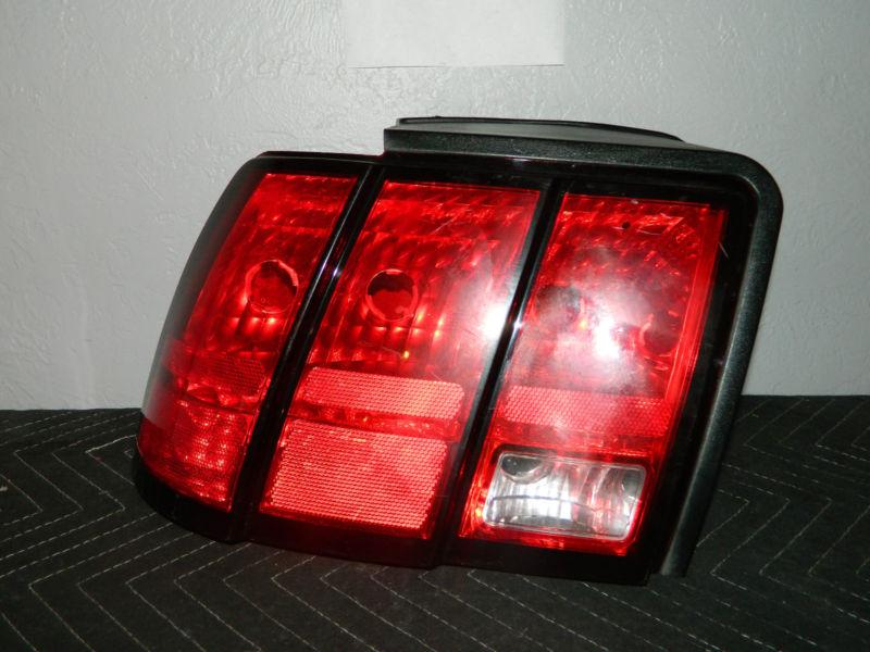 Oem 1999-2004 ford mustang right /  passenger side tail light assembly 