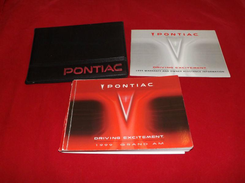 1999 pontiac grand am owner's manual guide set black case & warranty info