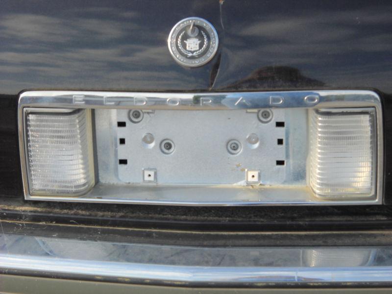 1994 cadillac eldorado  finish panel   license plate pocket  back-up lights