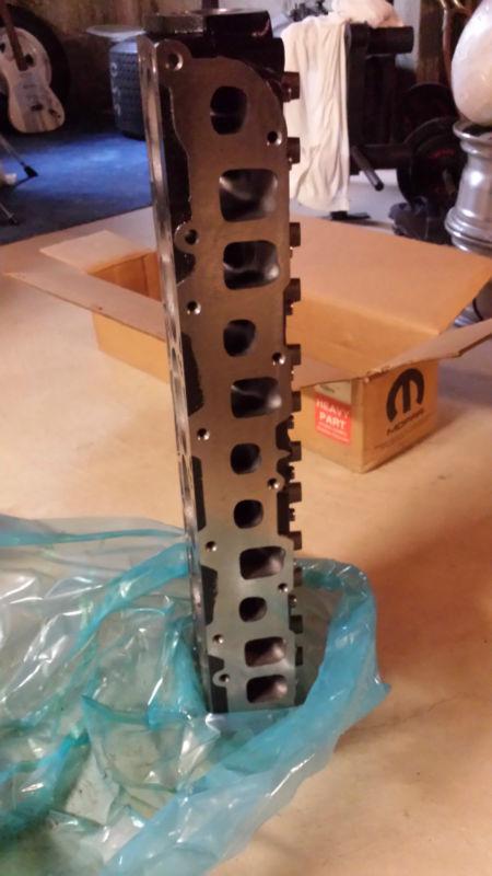 1999+ oem 4.0 cylinder head for chrysler i6 jeep grand cherokee 53010334 (new)