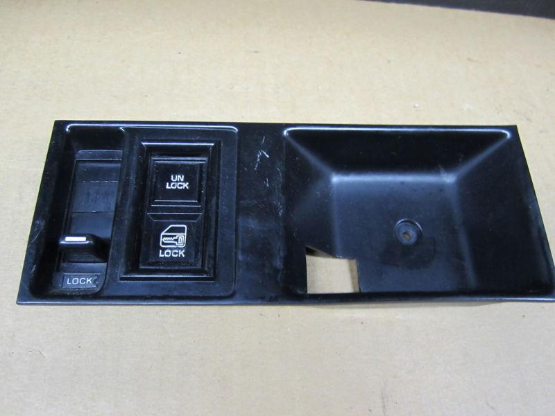 Cadillac deville 86-88 1986-1988  power door lock switch w/ bezel lh