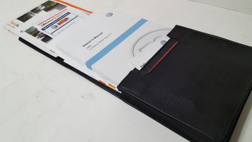 Oem genuine 2014 vw jetta owner&#039;s manual includes cover and extras