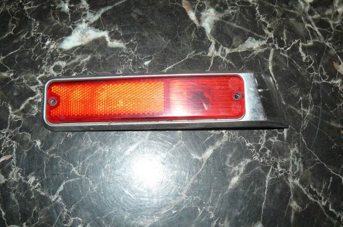 Driver side marker light housing, jeep grand wagoneer 85-91 fsj red