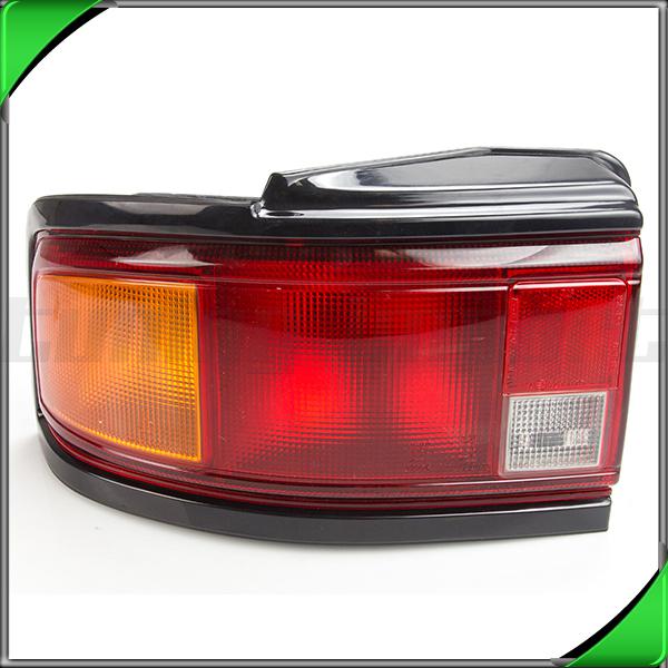 90-91 mazda protege 4dr se left driver rear tail light lamp housing amber signal