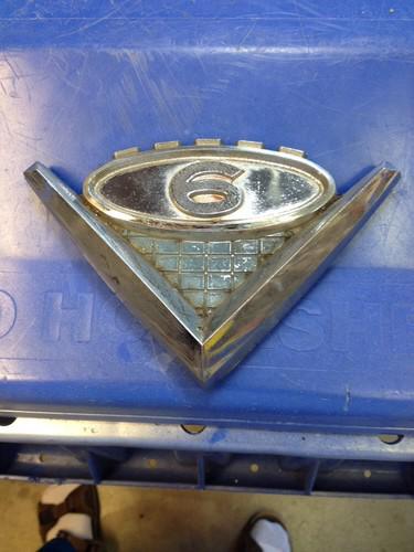 1962-66 gmc v6 emblem fender pickup truck part # 2419879  hot rod rat rod