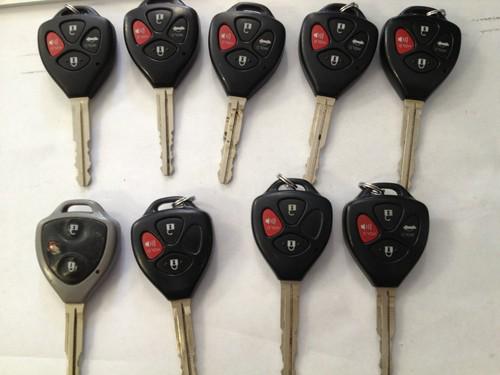 9 lot of toyota and scion factory remote head keys.