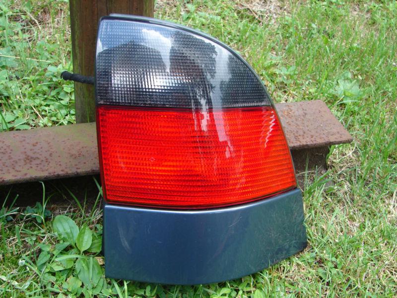 1999 00 01 saab 9-5 station wagon tail light rh sw cnr qtr mtd