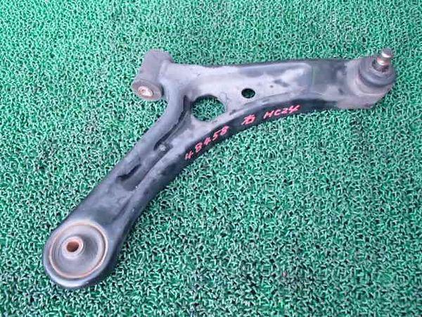 Nissan pino 2007 front right lower arm [5851720]