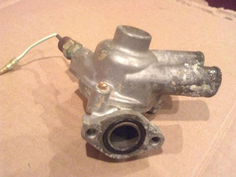 02-03 kawasaki prairie 650 kvf65o- thermostat housing - rr