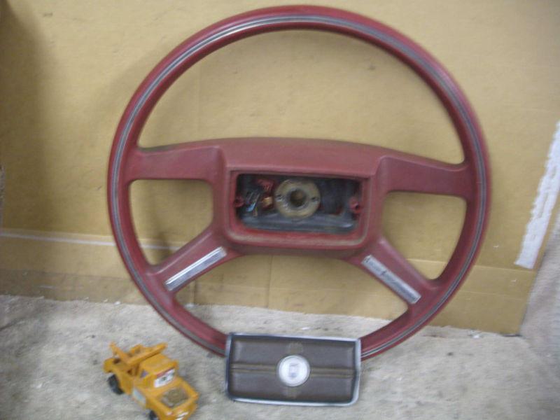 1980s ford steering wheel & horn cap, maroon