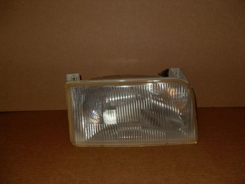 92 93 94 95 96 ford f150 r passenger headlight oem used head light lamp