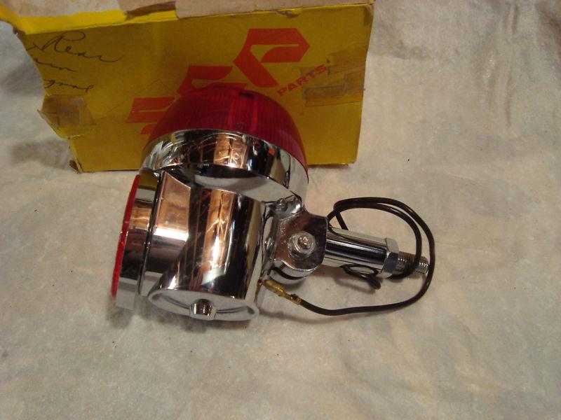 Suzuki gt750 nos 1972 turn signal w red lens ****rare *****