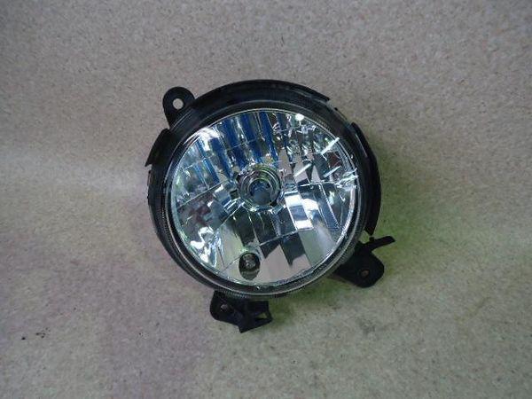 Daihatsu move 2000 left head light assembly [8910900]