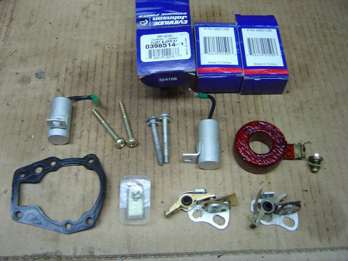 Used johnson/evinrude/omc float &amp; arm 0396514, 396514,points,coil screws,gasket