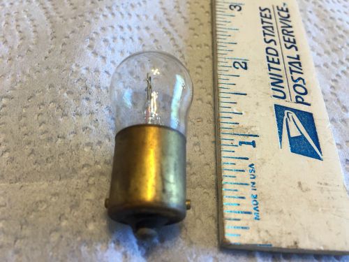 Ford; chrysler; gm; studebaker; old car light bulb,   pn 209.   item:  0066