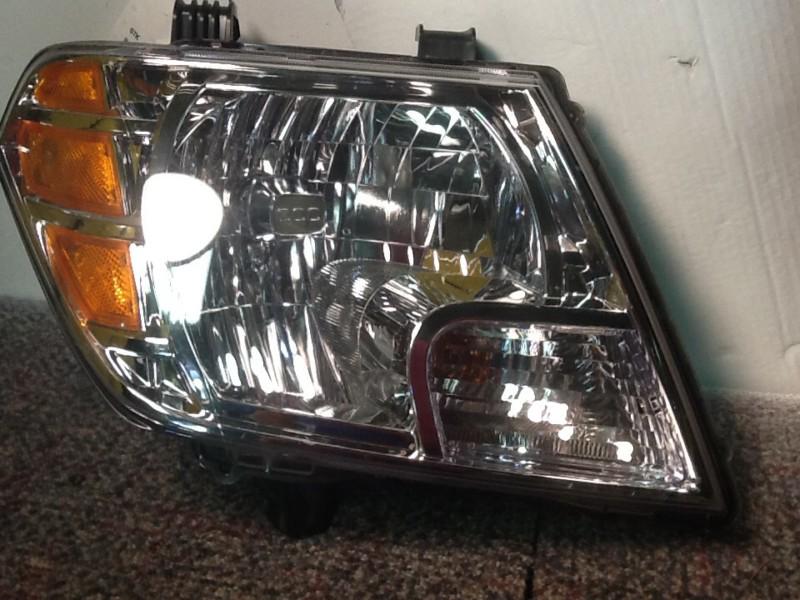 Nissan frontier headlight oem 09 10 11 12 13