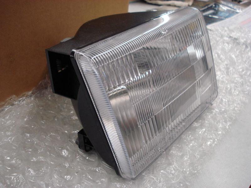 Brand new mopar # 55055118ab right headlamp oem still in box