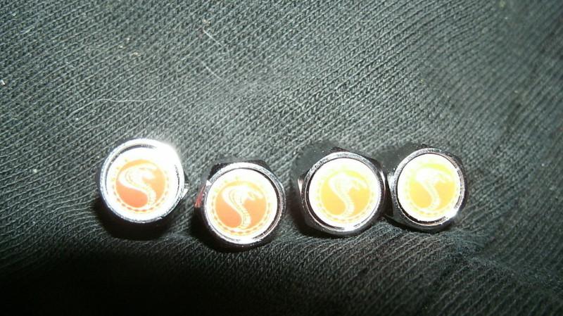 Ford mustang shelby cobra snake logo orange valve stem caps new vintage set of 4