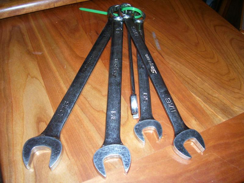 Five snap on wrenches