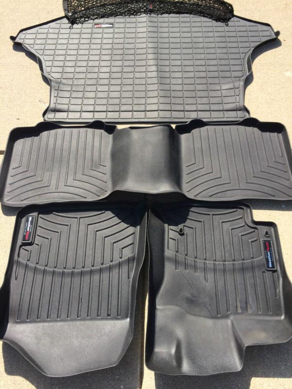 Weathertech floor and cargo liner.