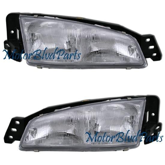 92 93 94 95 pontiac grand am headlights headlamps pair