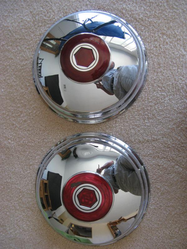 Packard hubcaps pair nice used oem with medalions