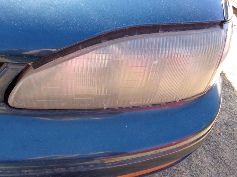 Driver head light 95 96 toyota camry turquoise 4 dr sedan 2.2 oem