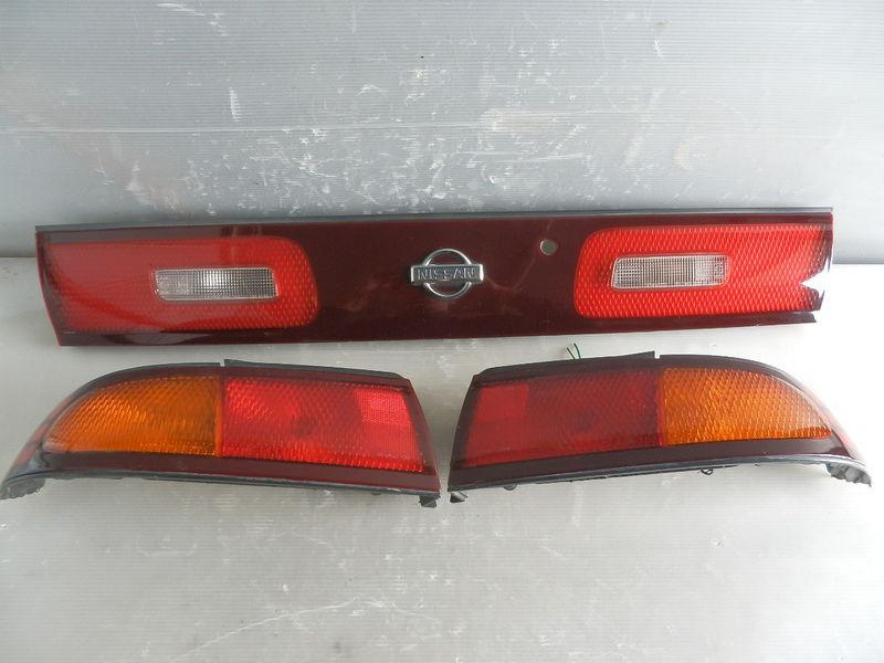 Jdm nissan silvia s14 kouki tail lights set with garnish factory oem