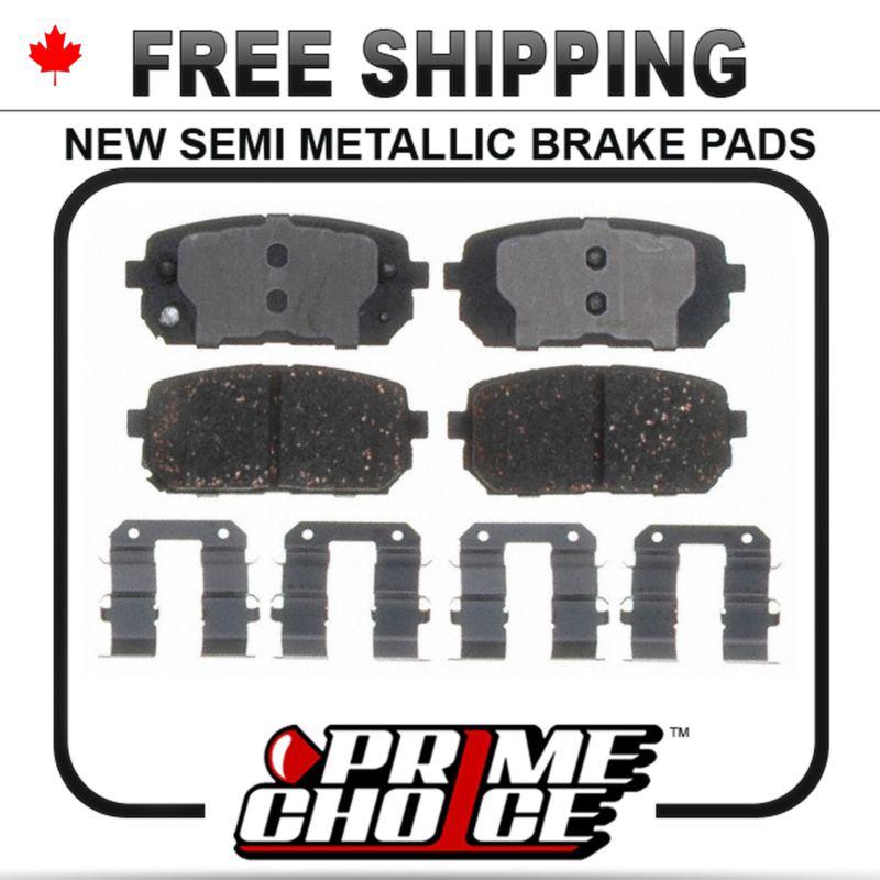 New premium complete set of rear metallic disc brake pads with shims