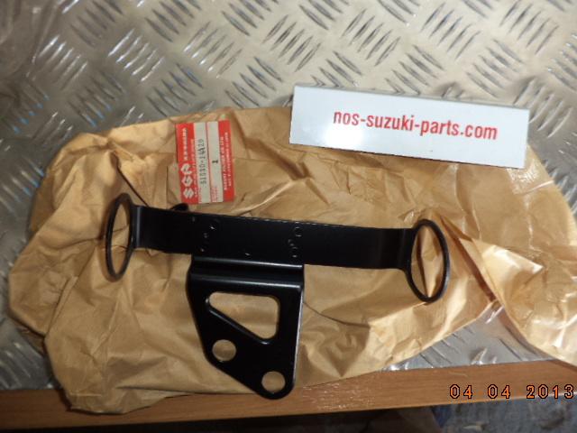 Dr650 1990-1991 bracket, headlamp, rh  new nos-suzuki-parts.com