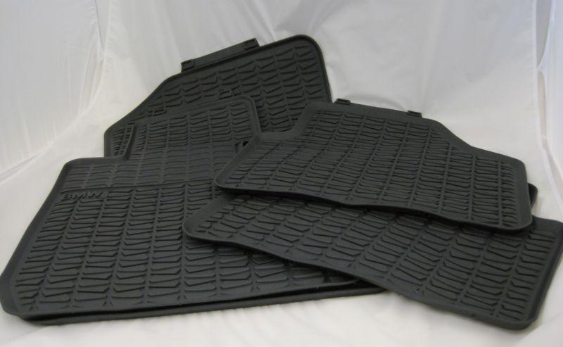 Bmw oem 2013-on x1 black rubber floormats with xdrive (awd) set of 4 