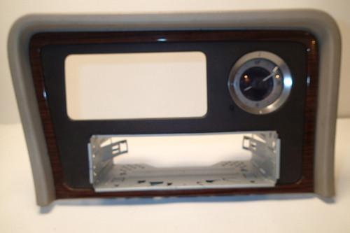Cadillac escalade lower console clock and face plate for aftermarket stereo