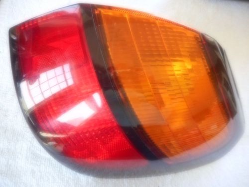 2000-2004 subaru outback wagon rh tail light cover (used)