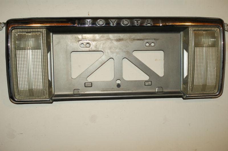 Toyota 4runner license plate mounting frame and back up lights 1992 92 93 94 95 