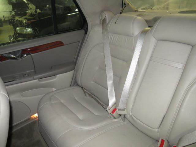 2003 cadillac deville rear seat belt & retractor only rh passenger tan