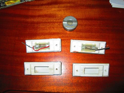 Four 1960 cadillac fleetwood 60 special door courtesy light housings.  very rare