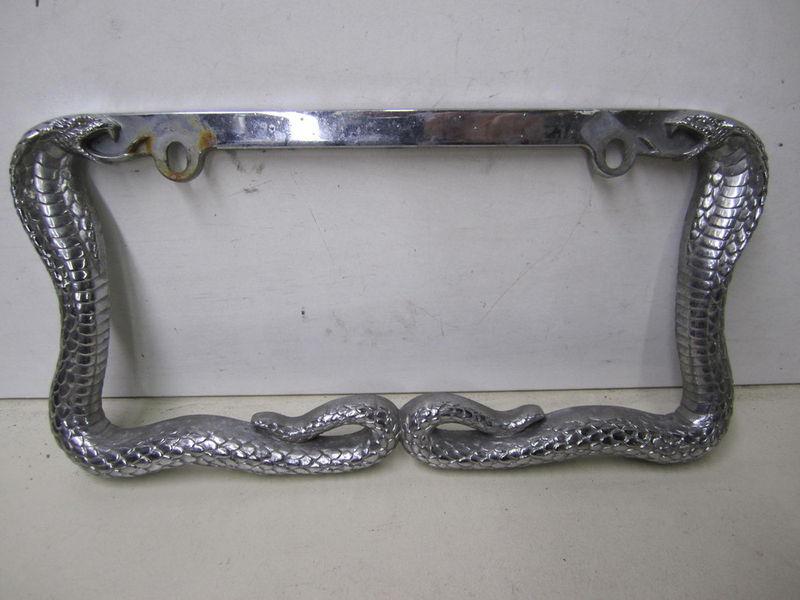 License plate frame snake
