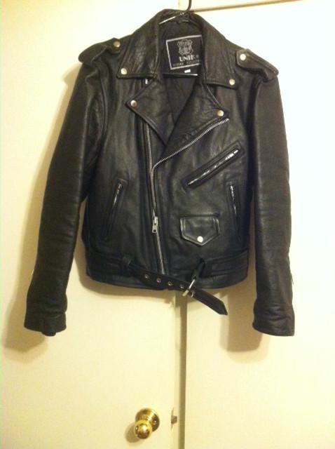 Unik black leather motorcycle jacket - size 40 - belt front - never been worn!!