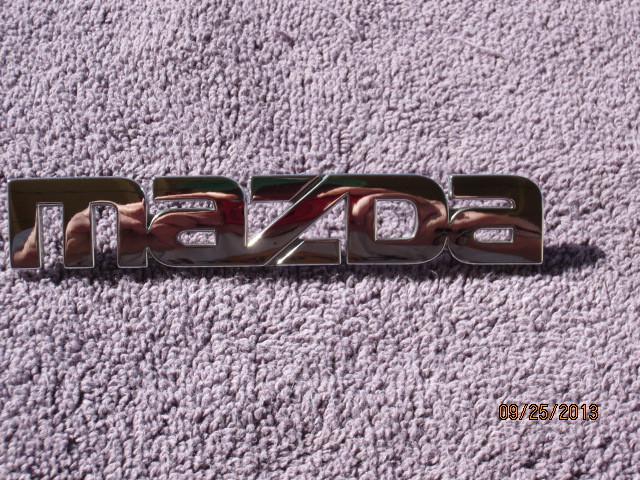 Mazda rear trunk emblem oem