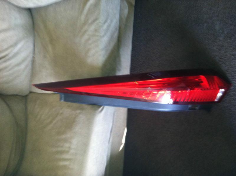 2010-2011 cadillac cts wagon right tail light..