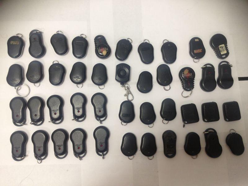 Lot of 43 lojack lo jack aftermarket remotes keyless entry transmitters fobs 