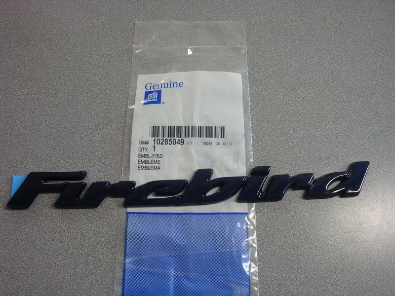 Nos oem pontiac firebird dark blue door emblem 1998 - 2002 