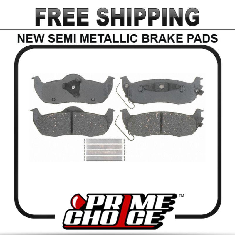 New premium complete set of rear metallic disc brake pads with shims